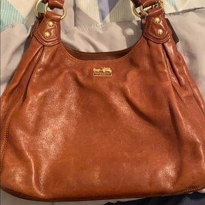Brown leather Coach purse